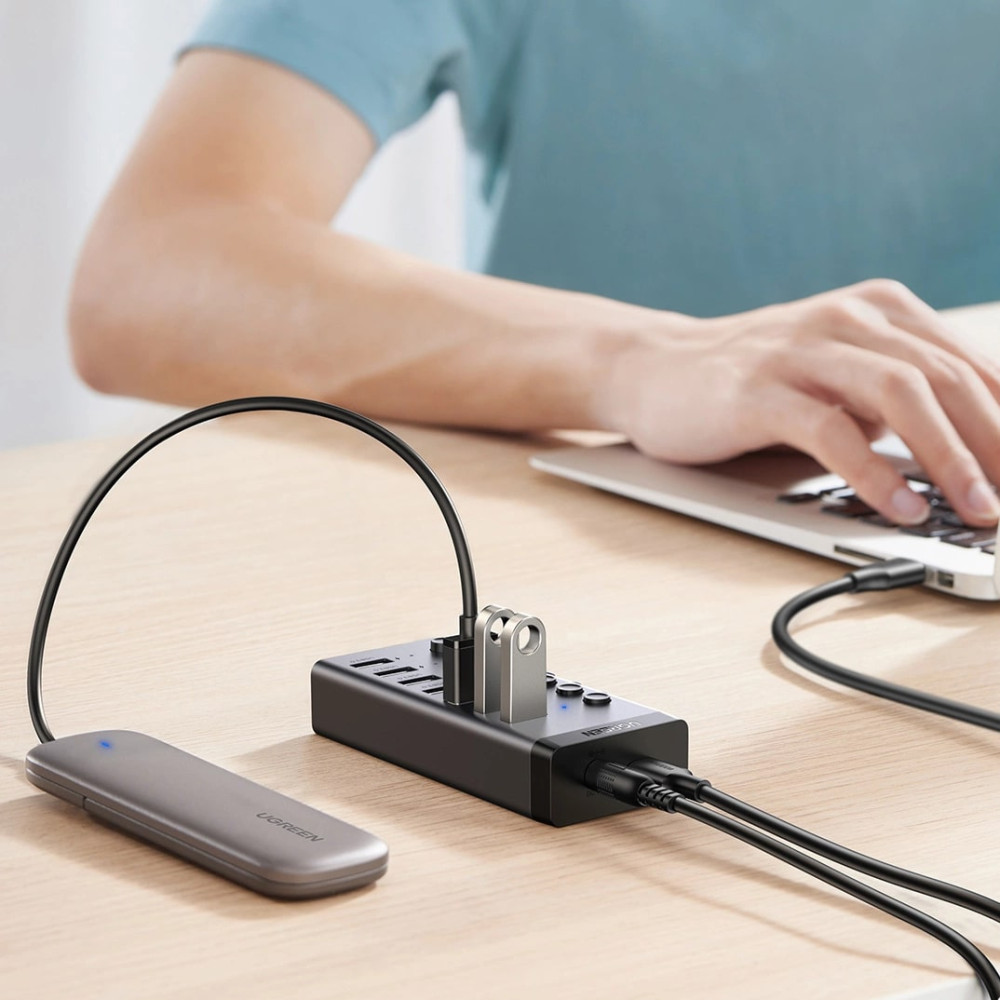 Хъб UGREEN CM481/90307 7в1 от AC към 7xUSB-A Хъб UGREEN CM481/90307 7в1 от AC към 7xUSB-A